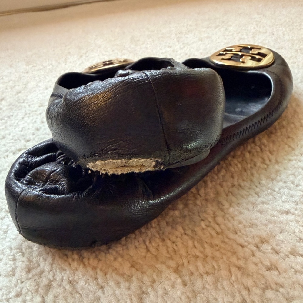 Tory Burch Black Flats with Gold Emblem - Picture 9 of 11